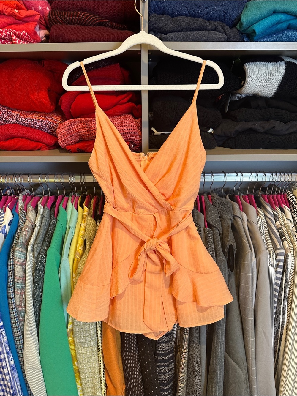Francesca’s orange adjustable strap lined back zipper peplum romper size XS NWT